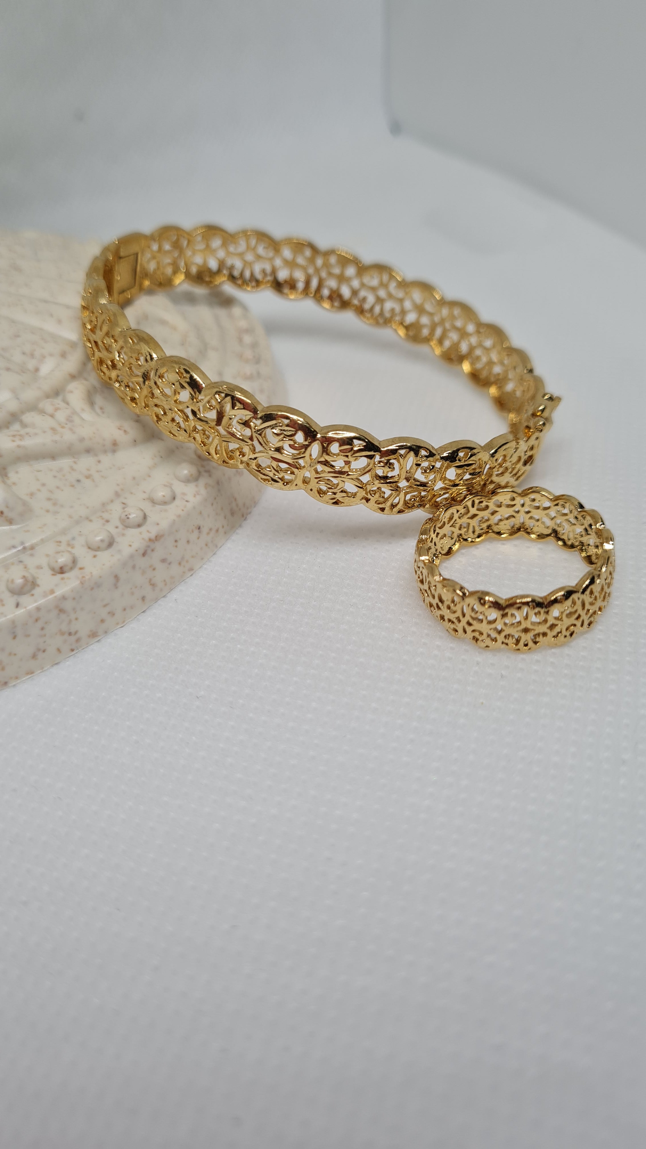 Juego brazalete y anillo